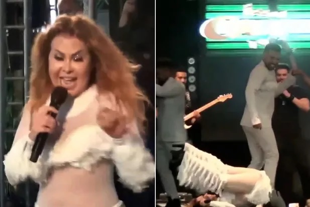 VÍDEO: Cantora Joelma se desequilibra e cai com as pernas para o ar durante show; assista